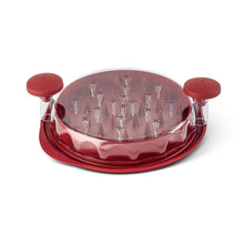 Red chicken shredder with clear dome lid and two side knobs, pin spikes visible