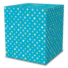 Facial tissue box with blue polka-dot pattern and small yellow dots