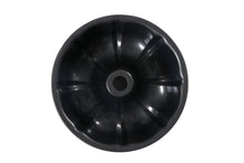 Round fluted cake pan underside with central drip hole vent.