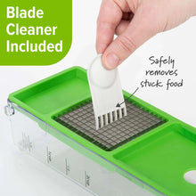 Green onion chopper with blade cleaner tool held over the cutting grid