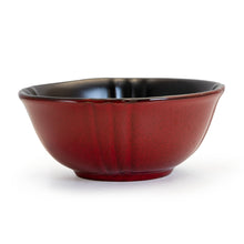 Red stoneware serving bowl with glossy finish