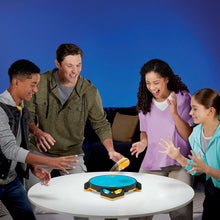 Electronic action game device on a round table as kids and adults play together