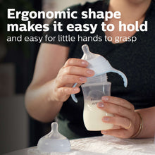 Philips Avent baby bottle with ergonomic shape, held in one hand