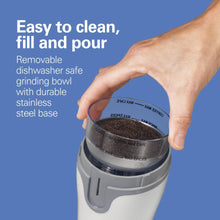 Electric coffee grinder with removable grinding bowl, clear lid and white housing