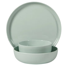Green melamine bowl, empty, round with glossy interior