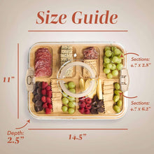 Rectangular bamboo charcuterie board with clear lid and multiple compartments, ring center