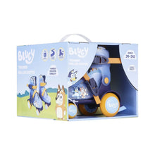 Adjustable kids roller skates in box, light blue boots with yellow wheels