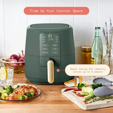 3 Qt air fryer in thyme green with gold handle, top-front control panel