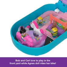 Minions compact playset interior with unicorn and minion figures plus bike accessory