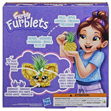 Mini electronic plush toy in a purple Furby Furblets box with pineapple character