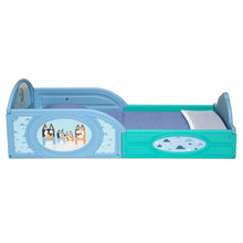 Toddler bed with guardrails, blue and teal frame with character artwork on side panels