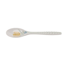 Serving spoon with tulip-style floral design near the bowl and leaf pattern on handle.