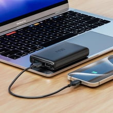 onn portable power bank connected with USB-C and USB-A cables