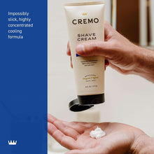 Shave cream tube with a dollop on open palm, refreshing mint cooling formula