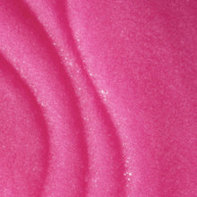 Bright pink Tree Hut Raspberry Fizz sugar scrub texture, glossy granular foam