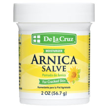 De La Cruz Arnica Salve moisturizer jar with green label for cracked skin, 2 oz