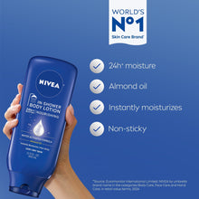 NIVEA in-shower body lotion bottle held in hand