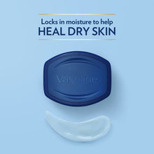 Petroleum jelly cap and smooth balm dollop, blue-lidded jar with gel trail