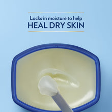 Petroleum jelly tub with scoop of creamy balm inside, glossy texture