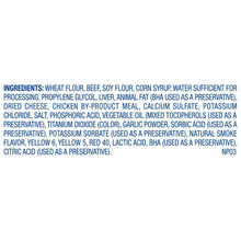 Dog treats ingredients list on packaging text, wheat flour, beef, soy flour, corn syrup