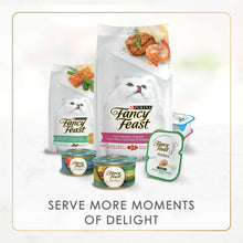 Assorted Fancy Feast kitten wet food cans, pouches, and small cup