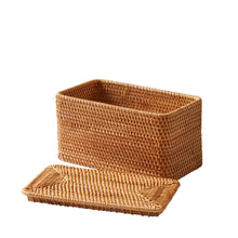 Brown rattan organizer basket with lid open, showing empty interior.