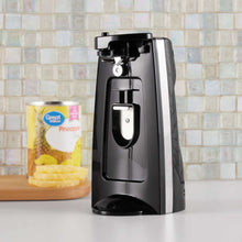 Black electric can opener and bottle opener on base, side view