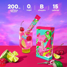 Cherry twist energy drink mix sticks with glass drink, lime, and cherries