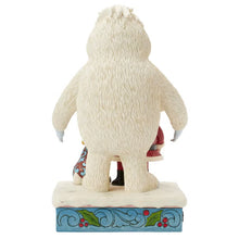 Back view of Jim Shore holiday statue, showing Bumble's textured fur and blue base