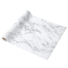 Shelf liner roll with white base and gray marble veining