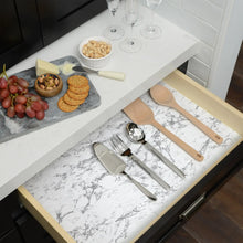 Shelf liner with white and gray marble-grain print, sized for kitchen drawers or shelves