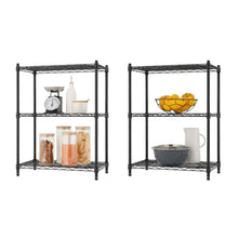 Black modular wire shelving racks with open shelves, displaying kitchen items and containers