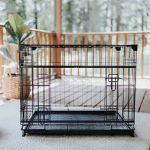 Black wire dog crate with front open door and removable bottom tray