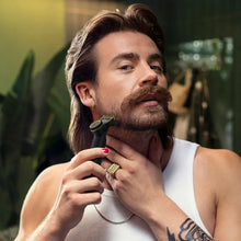 Hybrid electric trimmer shaver held to beard for face trimming