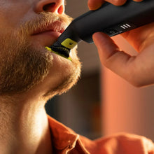 Hybrid electric trimmer shaver shaving facial hair with yellow blade