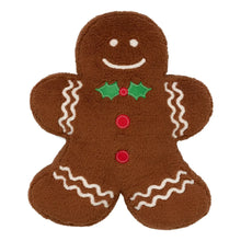 Gingerbread decorative pillow, brown plush with white icing smile and red button details