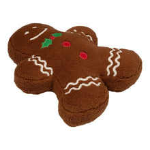 Gingerbread decorative pillow, brown plush ginger shape with white icing swirls and red dots