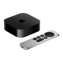 Apple TV 4K box and silver remote shown from an angled view