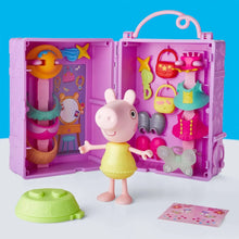 Purple dress-up wardrobe playset with small doll and accessories, open case view