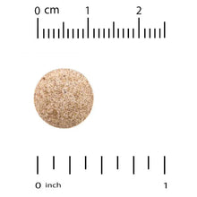 Hair growth supplement tablet sample with size ruler measurement