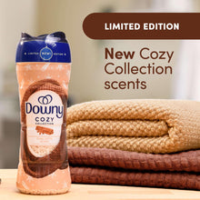 Downy Cozy laundry scent booster beads bottle with folded towels, limited edition
