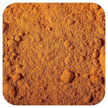 Turmeric powder, fine golden-brown powder texture