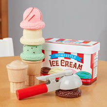 Stackable ice cream cones in pink, green, cream, and dark brown with scoop