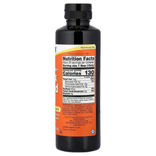 Flax seed oil bottle back label with nutrition facts text and ingredients panel, black cap