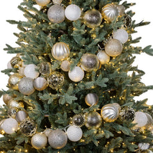 Silver ornament garland with LED lights draped across a Christmas tree