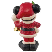 Back view of the Disney holiday Mickey Mouse statue, showing its carved red coat and black shoes