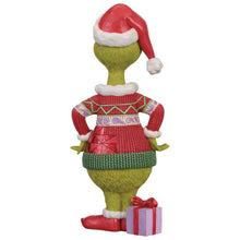 Back view of the Jim Shore Grinch statue, showing sweater details and a gift at his feet