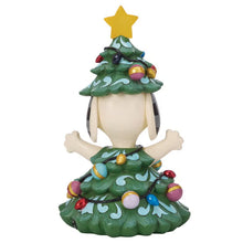 Back of the Snoopy Christmas tree statue, showing the layered green tree costume and lights