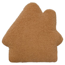 Back of a gingerbread house pillow in brown textured fabric