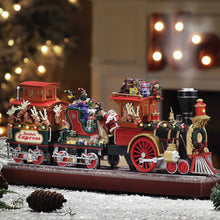 Mr. Christmas Santa's Express Train with Santa, elves, reindeer and gifts on a display base